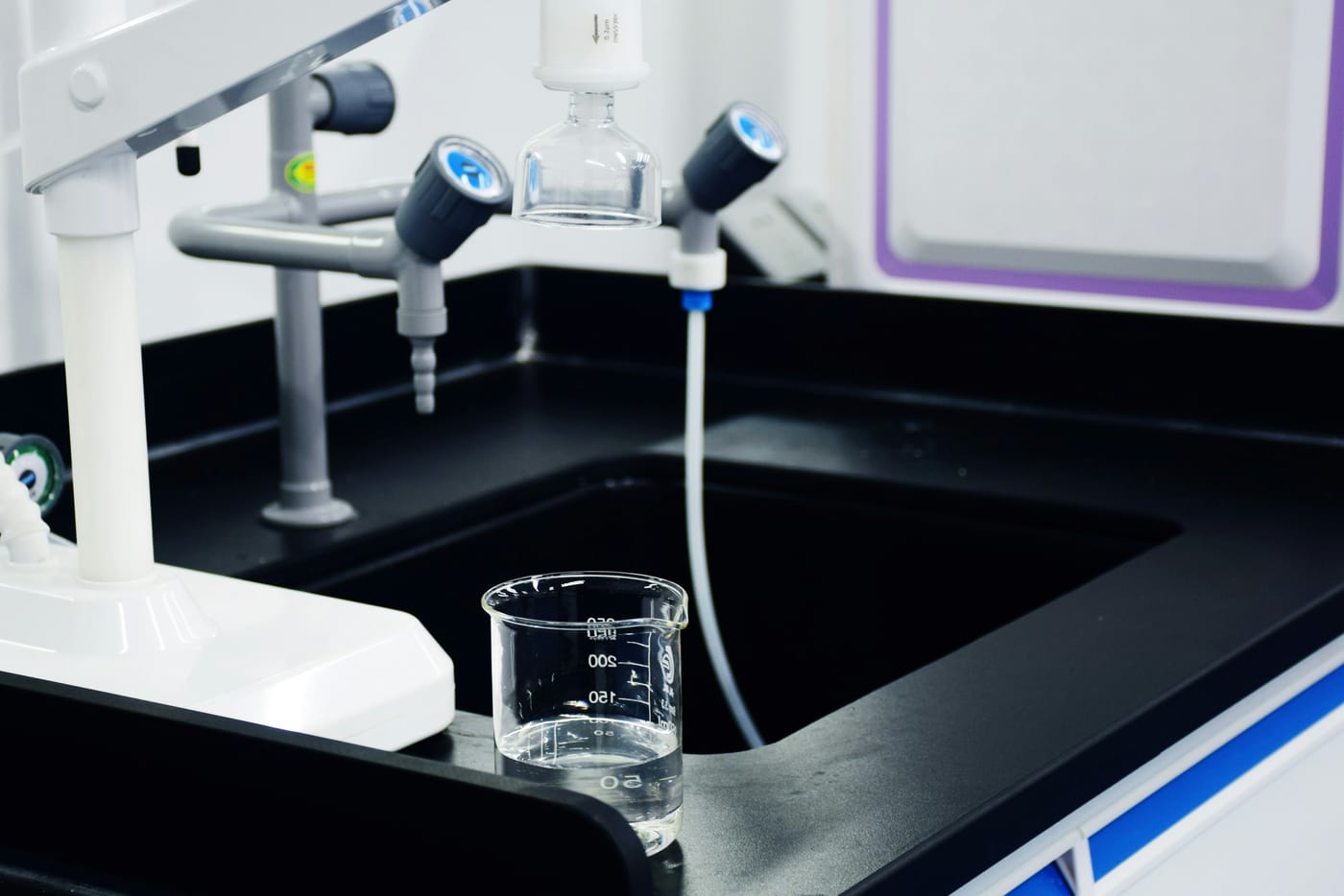 Water sample being tested at a filtration laboratory sink