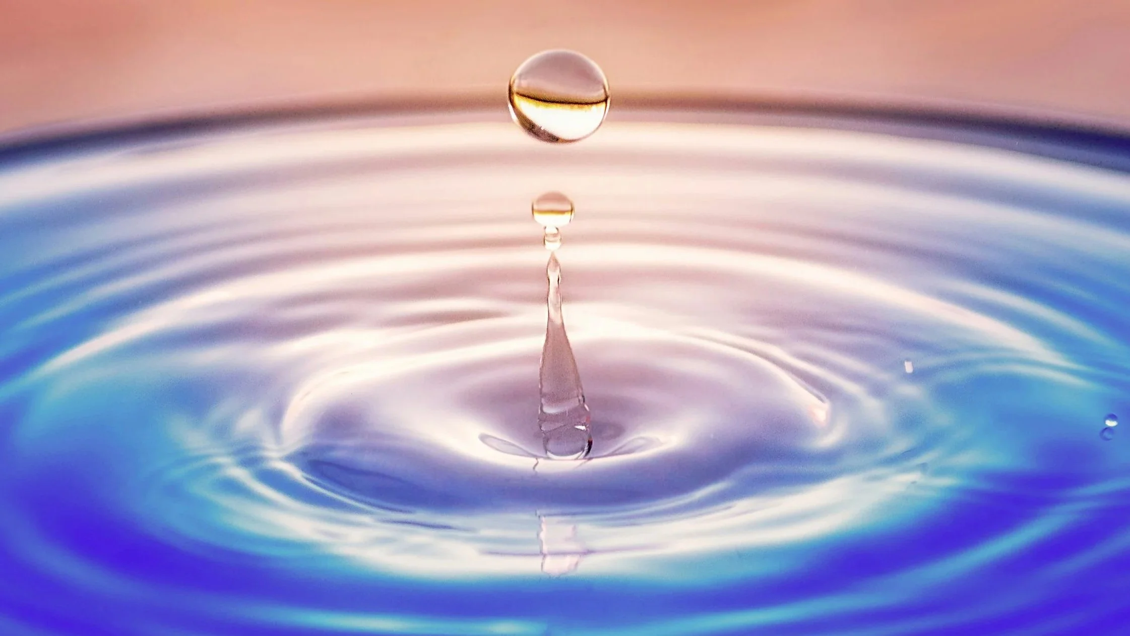 Clear water flowing, representing clean water infrastructure
